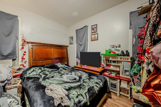 bedroom featuring light hardwood / wood-style flooring