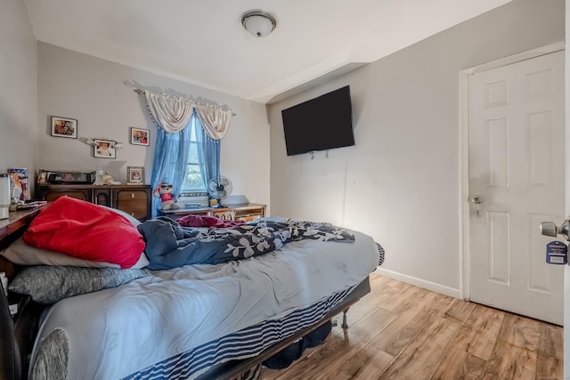 6 Grove Ct, Waterbury, CT 06710 - bedroom with light wood-style floors and baseboards