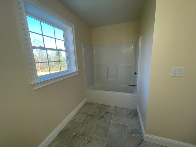 bathroom with bathtub / shower combination