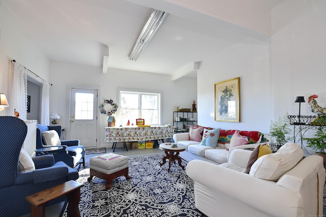 living room with beam ceiling