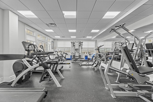 gym with a drop ceiling