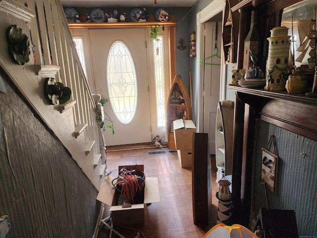 foyer entrance with wood-type flooring