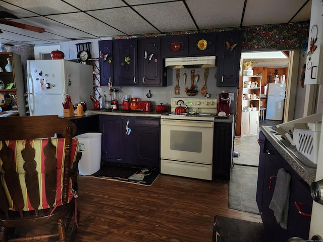 kitchen with a drop ceiling, dark wood-type flooring, and white appliances