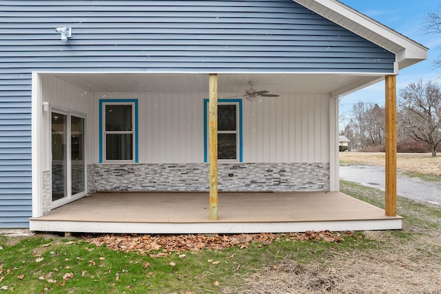 exterior space featuring ceiling fan