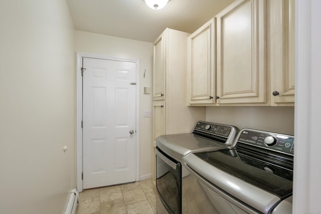 washroom featuring cabinets and independent washer and dryer