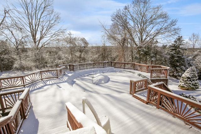 view of snow covered deck