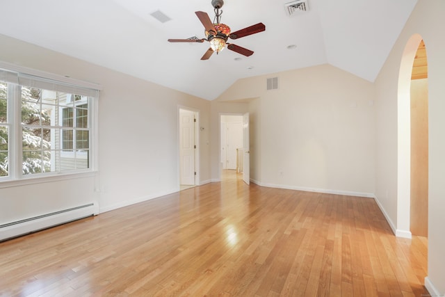 empty room featuring ceiling fan, light hardwood / wood-style flooring, a baseboard heating unit, and lofted ceiling