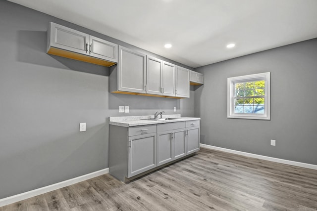 172 Quinnipiac Ave, New Haven, CT 06513 - kitchen featuring gray cabinets, light wood-style floors, light countertops, and recessed lighting