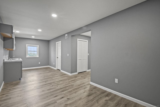 172 Quinnipiac Ave, New Haven, CT 06513 - unfurnished living room with wood finished floors and recessed lighting