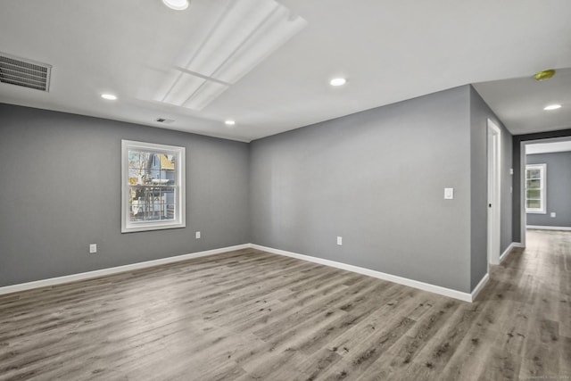 172 Quinnipiac Ave, New Haven, CT 06513 - spare room with plenty of natural light, wood finished floors, recessed lighting, and a smoke detector