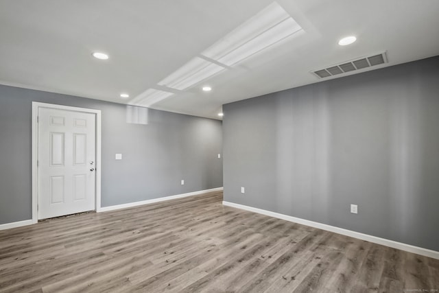 unfurnished room featuring light wood-type flooring