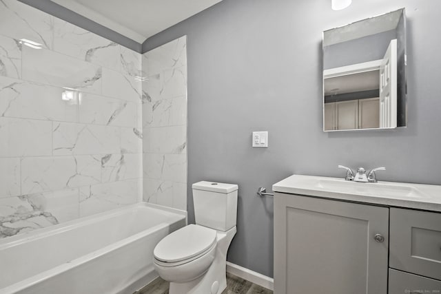 full bathroom featuring wood-type flooring, vanity, toilet, and tiled shower / bath