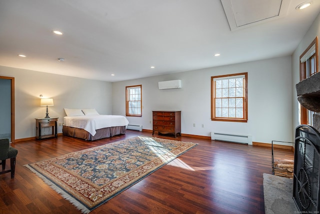 bedroom with dark hardwood / wood-style flooring, a baseboard radiator, and multiple windows