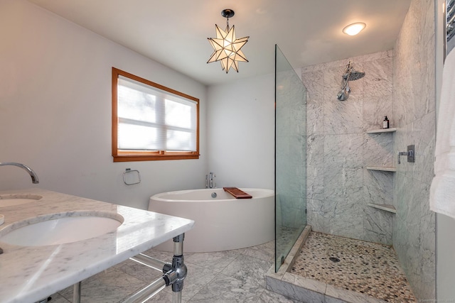 bathroom featuring vanity and separate shower and tub