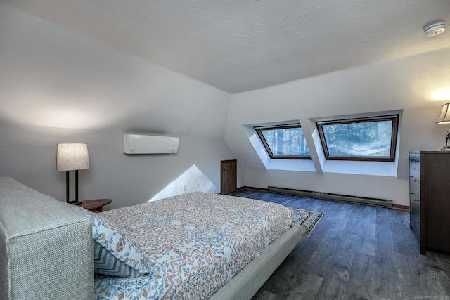 bedroom with dark hardwood / wood-style flooring, an AC wall unit, baseboard heating, and vaulted ceiling with skylight