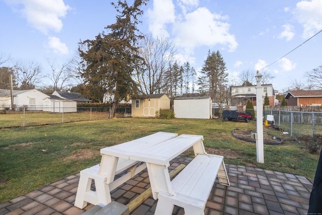 view of patio / terrace featuring a shed