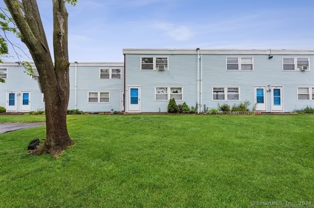 view of front of home with a front lawn