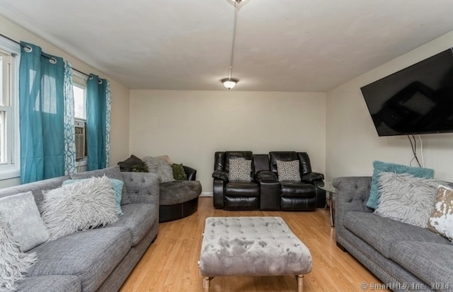 living room with light hardwood / wood-style floors