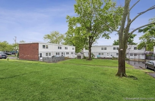 25 Liberty St Unit E, New Haven, CT 06519 - surrounding community featuring a storage unit and a lawn