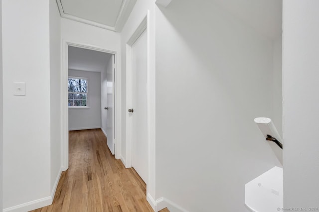 hall with light hardwood / wood-style floors