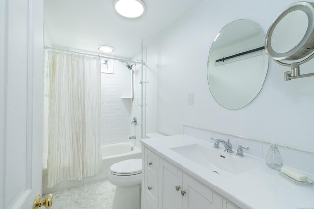 full bathroom featuring vanity, toilet, and shower / bathtub combination with curtain