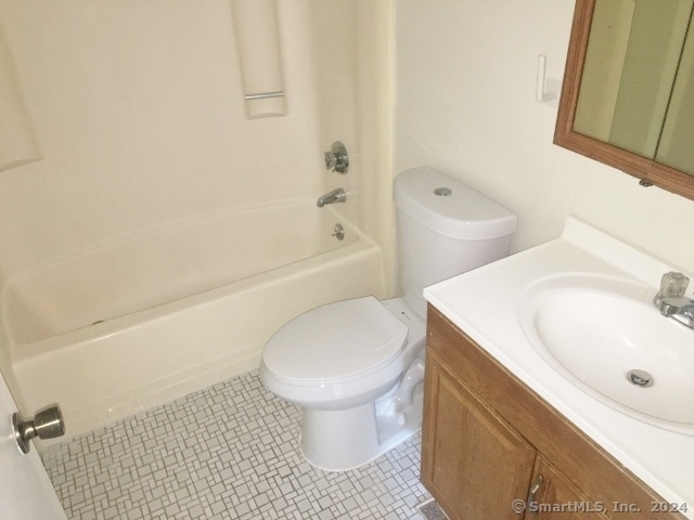 full bathroom with vanity, toilet, and tub / shower combination