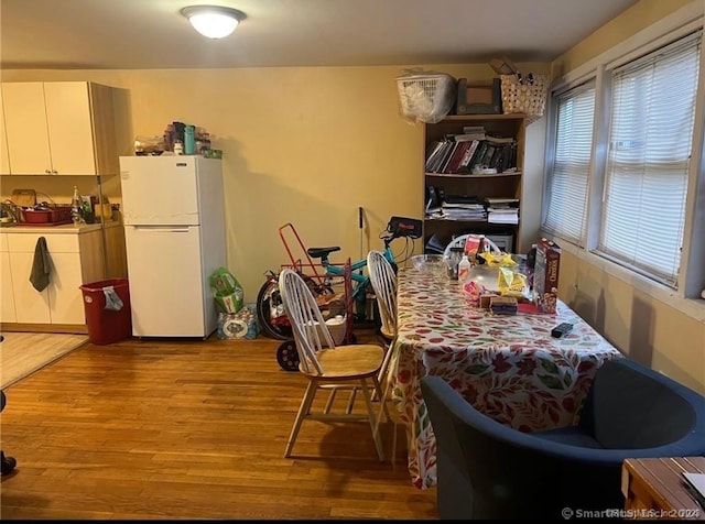 dining room featuring light wood-type flooring