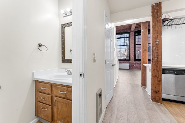 bathroom featuring hardwood / wood-style floors and vanity