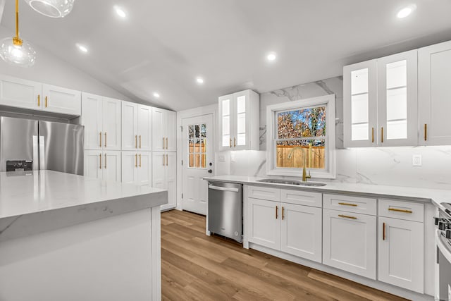 kitchen with white cabinetry, sink, and appliances with stainless steel finishes