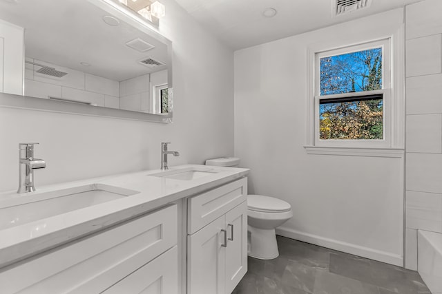 full bathroom with vanity, bathing tub / shower combination, and toilet