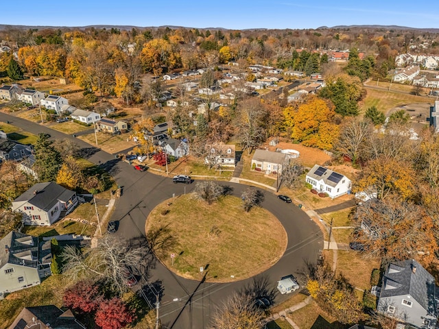 aerial view featuring a residential view and a view of trees