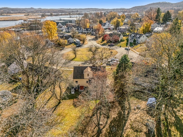 aerial view featuring a water and mountain view