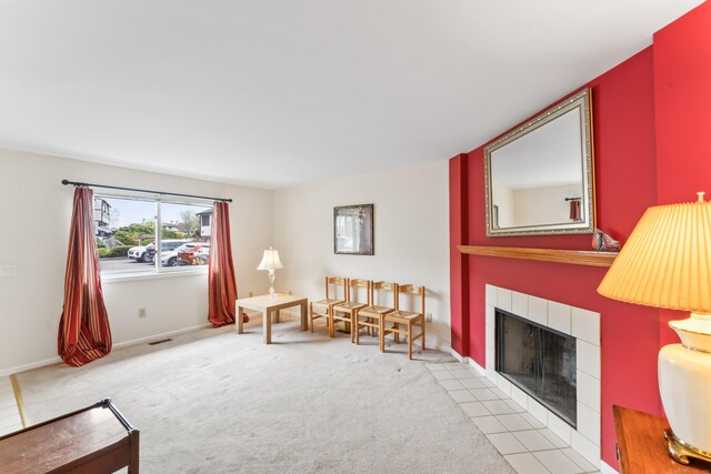 27 Crows Nest Ln Unit 15E, Danbury, CT 06810 - living area featuring baseboards, a tile fireplace, visible vents, and carpet