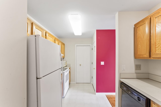 27 Crows Nest Ln Unit 15E, Danbury, CT 06810 - kitchen with light floors, light countertops, and white appliances