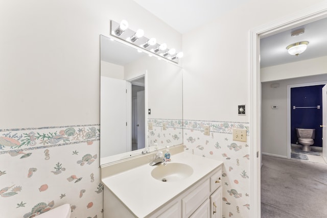 27 Crows Nest Ln Unit 15E, Danbury, CT 06810 - half bathroom with wallpapered walls, toilet, and vanity