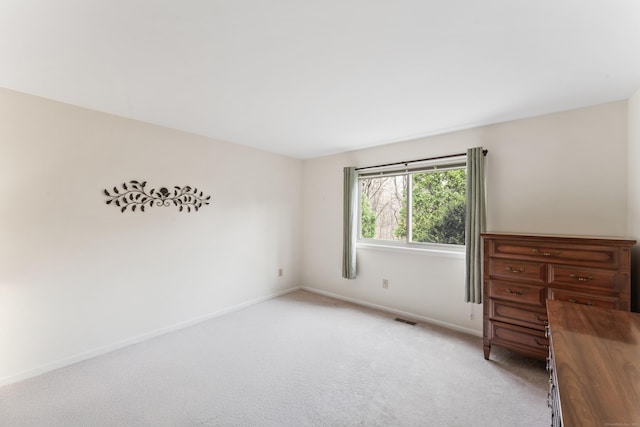 27 Crows Nest Ln Unit 15E, Danbury, CT 06810 - unfurnished bedroom featuring light carpet, baseboards, and visible vents