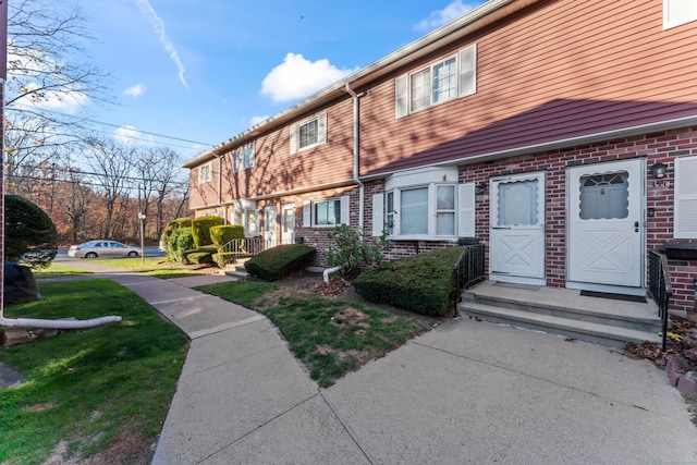 exterior space with a front yard