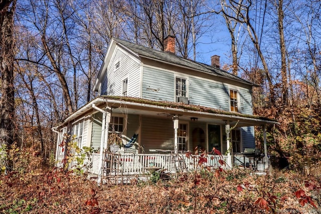 farmhouse with covered porch