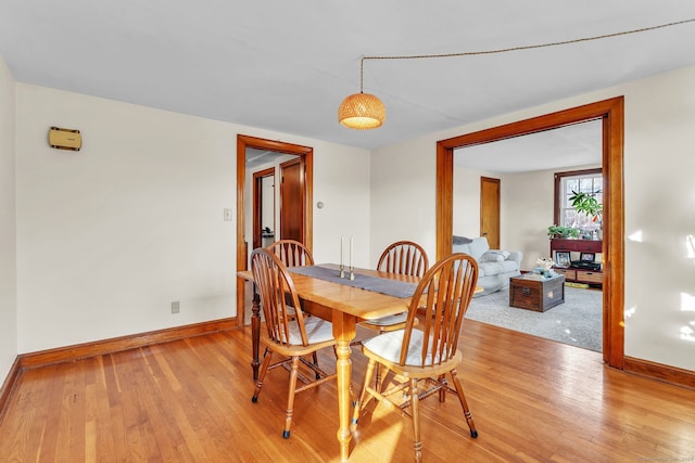 dining room featuring light hardwood / wood-style floors