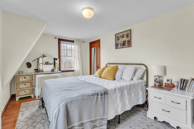 bedroom with light hardwood / wood-style flooring