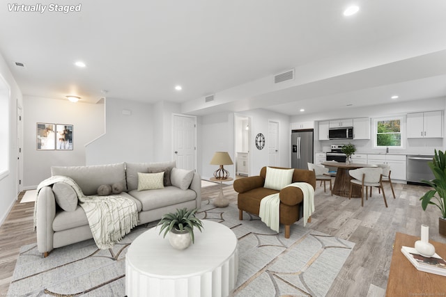 living room featuring light hardwood / wood-style floors