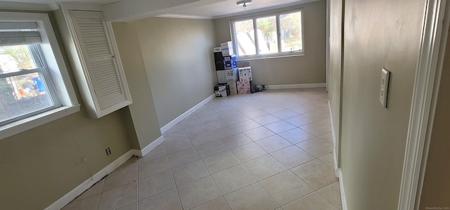 interior space with a wealth of natural light and crown molding