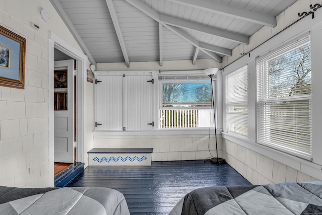 sunroom / solarium with plenty of natural light and lofted ceiling