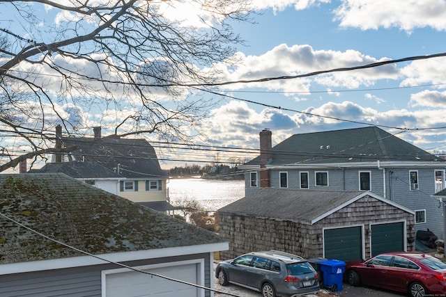 view of side of home with a garage