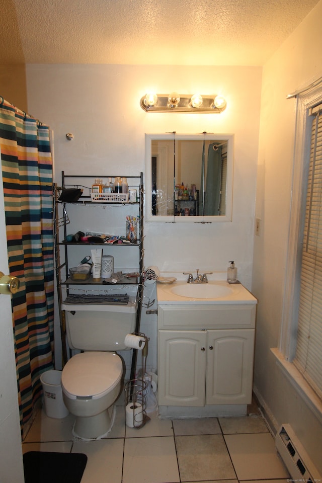 bathroom featuring a baseboard heating unit, tile patterned floors, a textured ceiling, toilet, and vanity