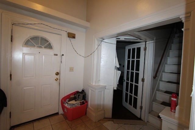 entrance foyer with light tile patterned flooring