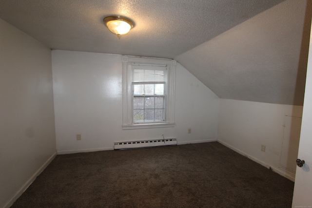 bonus room featuring a textured ceiling, dark carpet, baseboard heating, and lofted ceiling