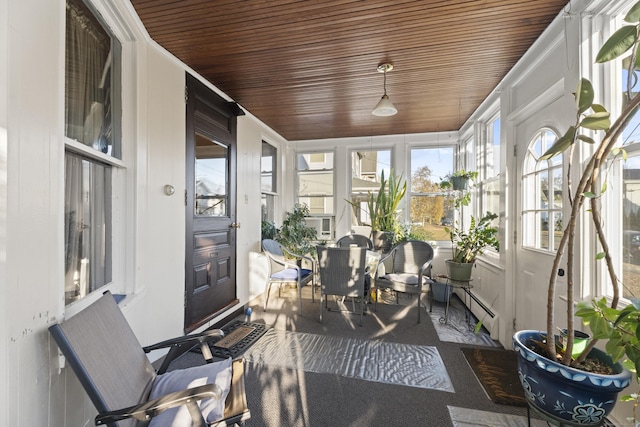 sunroom with baseboard heating and wooden ceiling