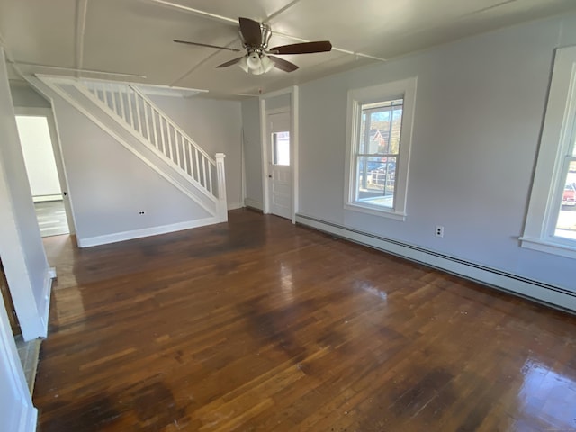 625 N Main St, Norwich, CT 06360 - unfurnished living room featuring a baseboard heating unit, hardwood / wood-style flooring, stairway, a ceiling fan, and baseboard heating