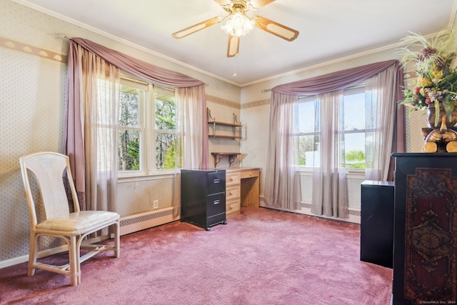 sitting room with ceiling fan, carpet floors, a baseboard heating unit, and ornamental molding